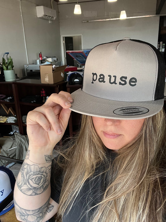 pause Trucker Hat